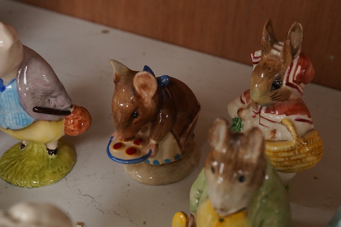 Twenty Beatrix Potter figures, mostly later production figures, largest 11cm high